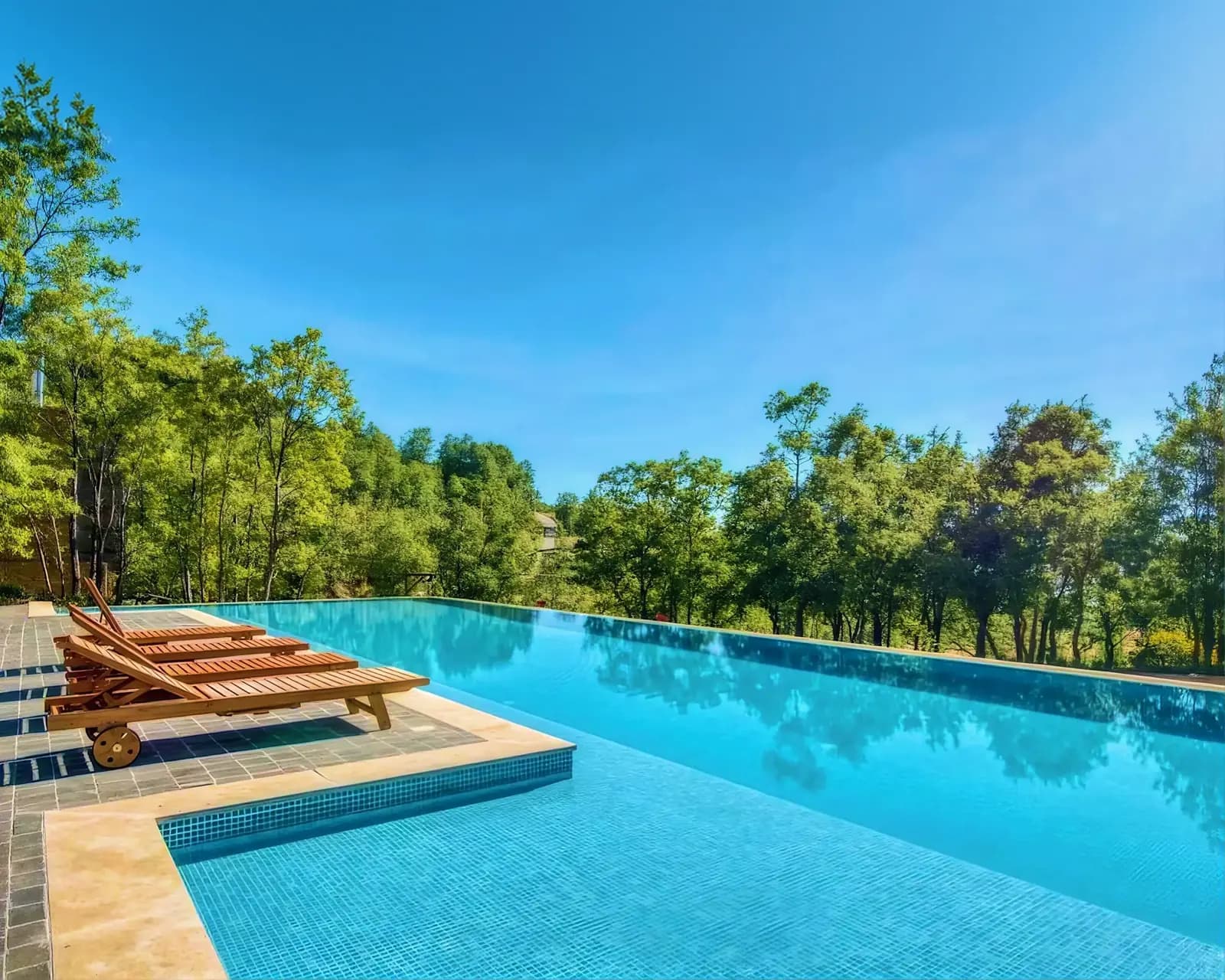 The infinity pool under a clear sky